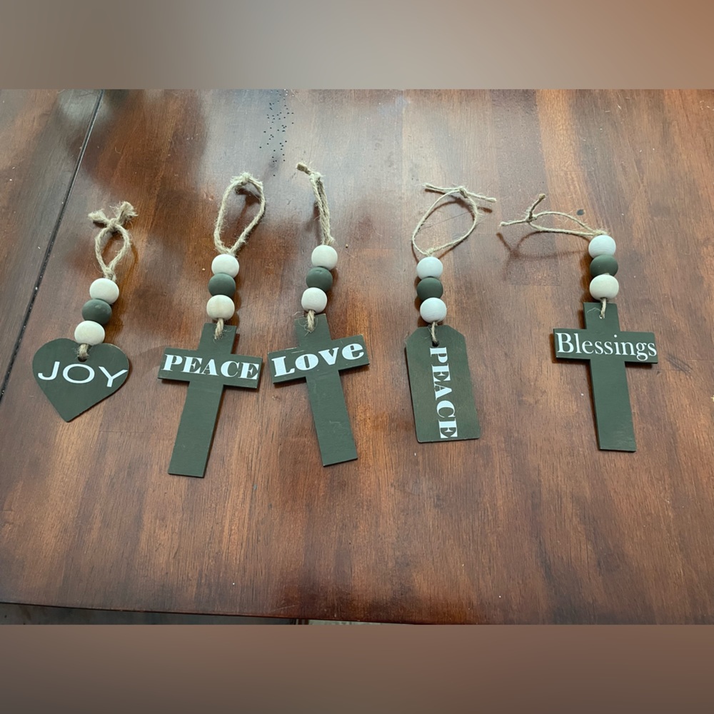 Homemade beaded Christmas ornaments are cabinet knob hangers